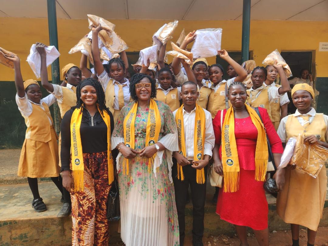 DEW Empowerment Foundation team distributing school supplies to students